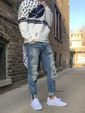 Palestine Man wearing keffiyeh bandana and hoodie streetwear with brick background