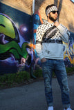 Palestine Man wearing keffiyeh bandana and hoodie streetwear with graffiti background