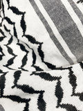 Classic Palestine Black and White Keffiyeh - Bandana-Keffiyeh-Description This is a keffiyeh bandana (approximately half the size of an original keffiyeh) donning the original Palestinian black and white color and style. This keffiyeh pattern has become synonymous with unity and solidarity for Palestine and its people. See our blog here where we go into detail on where the keffiyeh originated and how it became an integral part of the Palestinian identity. Get your's today and show your support f
