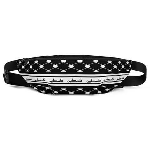 Layl Keffiyeh Fanny Pack-Fanny Pack-Description Strap up with our signature layl (night) keffiyeh (also spelled kufiya) fanny pack! It's the ultimate accessory that has everything—the right size, a small inside pocket, and adjustable straps—to become your favorite fashion item. Be sure to pair it with our Layl Face Mask or other items from our catalog to make a more complete look! Get yours today! Features • 100% polyester• Dimensions: H 6.5'' (16cm), W 13'' (33cm), D 2¾'' (7cm)• Water-resistant