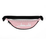 Pink Keffiyeh Fanny Pack-Fanny Pack-Description Strap up with our signature pink keffiyeh (also spelled kufiya) fanny pack! It's the ultimate accessory that has everything—the right size, a small inside pocket, and adjustable straps—to become your favorite fashion item. Be sure to pair it with our Yawm Face Mask or other items from our catalog to make a more complete look! Get yours today! Features • 100% polyester• Dimensions: H 6.5'' (16cm), W 13'' (33cm), D 2¾'' (7cm)• Water-resistant materia