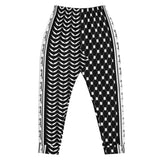Keffiyeh Joggers - Black - Dual Pattern-Joggers-Description Who doesn't love the iconic keffiyeh (also spelled kufiya) pattern? Now enjoy the beauty of the keffiyeh on your legs! The bands running down the sides translate to "Palestine" so everyone knows what you're repping. These aren't your traditional pattern bottoms as each leg has a different piece of the keffiyeh pattern. You won't find joggers like these anywhere else. Dare to be different? Get yours now! Quality These will be among the s