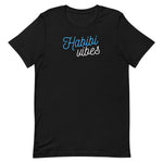 Habibi Vibes T-Shirt-T-Shirt-Description Translated to English "Habibi" means "my love" (masculine) but can be used in many different ways and situations. More importantly, it's a vibe. Think "Babe vibes", "Bf Vibes", etc. Get the matching "Habibti Vibes" shirt to match with your significant other! Quality You have to put this shirt on to believe the Premium T-Shirt quality. This shirt feels supremely soft and lightweight, with the right amount of stretch. It's comfortable and flattering for bot